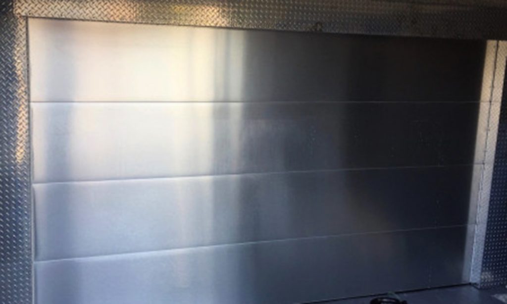 metal garage door with window film