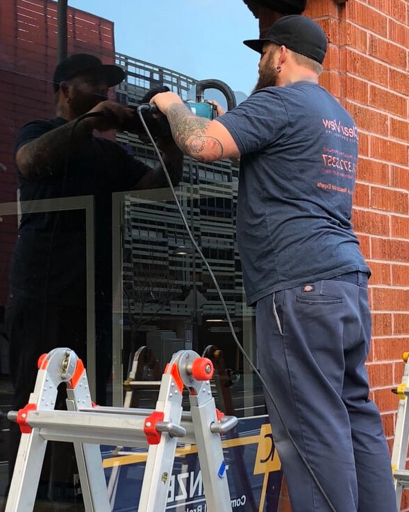 Man restoring glass