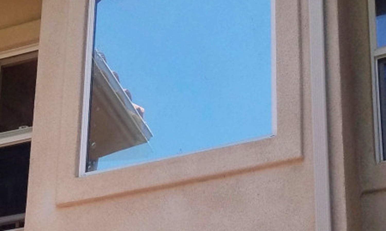 building exterior window with window film