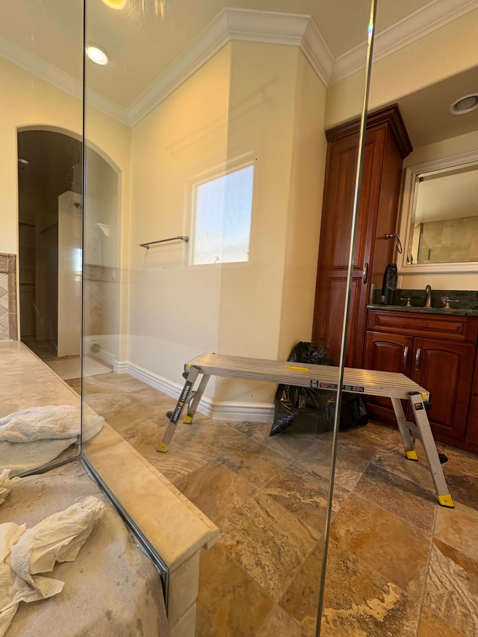 shower glass after professional mineral deposit removal fully restored Seal Beach